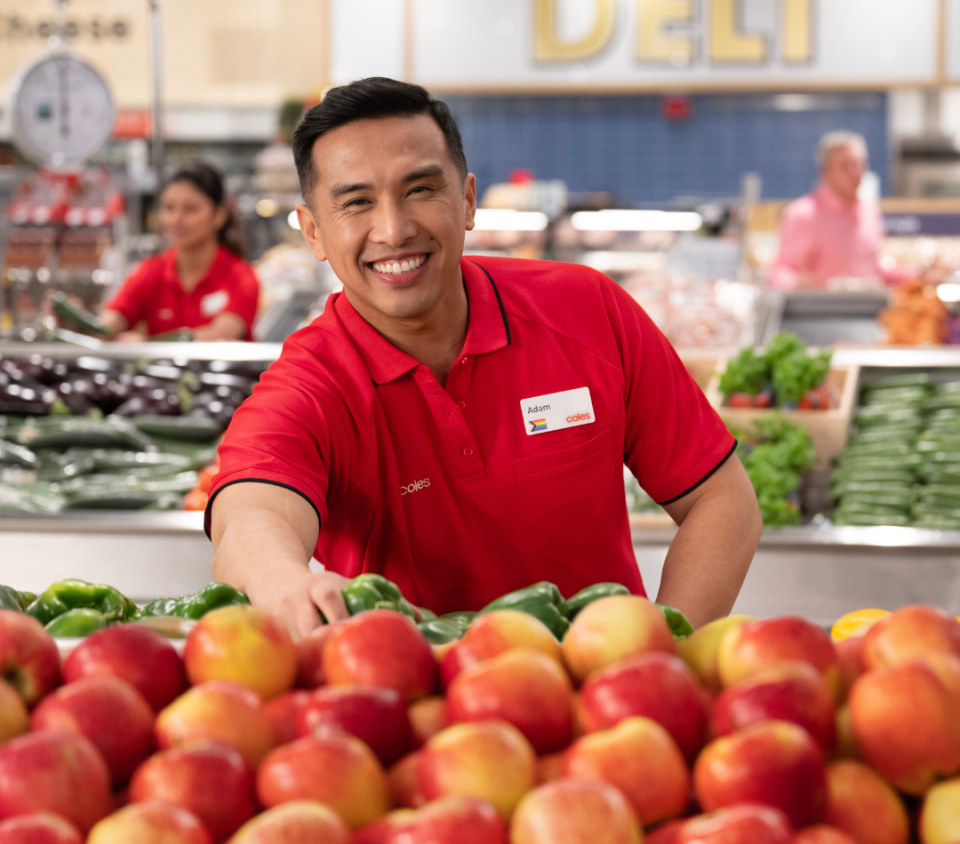 Coles refresh, man at the produce aisle